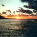 Sunset behind Ischia Island (© Portanapoli.com)